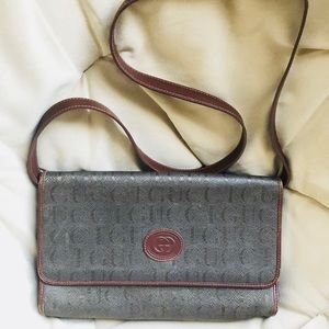 Gucci clutch with cross body strap